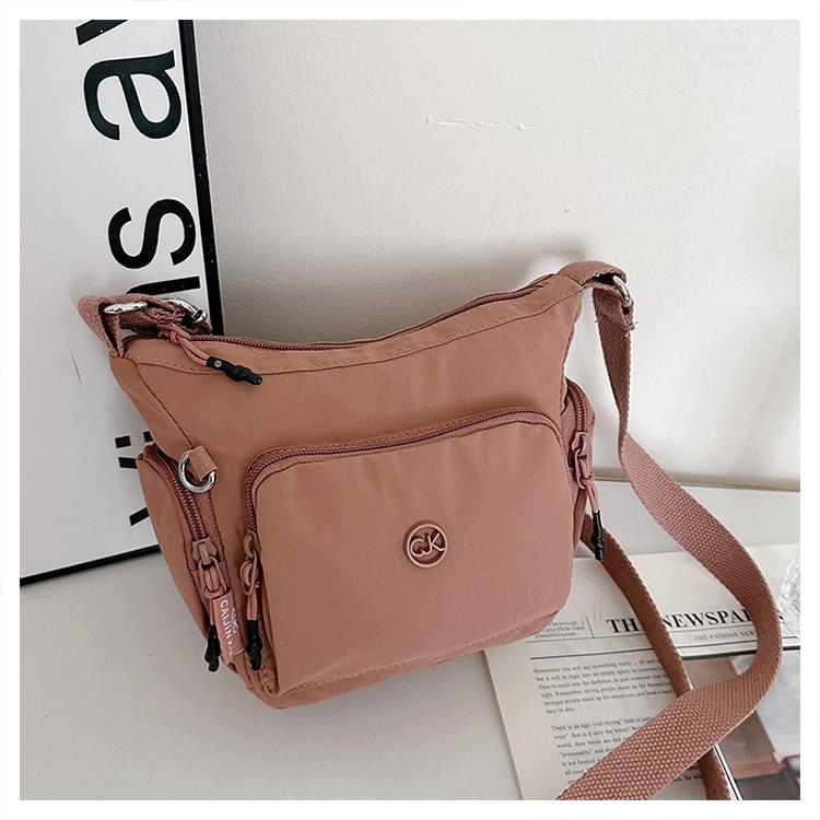 

Универсальный рюкзак для покупок Новая сумка через плечо Модная женская сумка-мессенджер Легкая нейлоновая сумка с защитой от брызг розовый