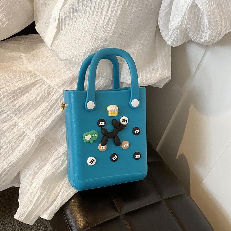 I Kleine Strandlochtasche, lässige Umhängetasche, Handtasche, wasserdichte und verlustsichere Reise-I-Geleetasche.