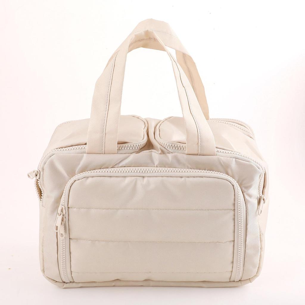 Grande Trousse de Maquillage Matelassée - Élégante, Légère, Portable, avec Compartiments et Double Ouverture pour le Voyage et les Articles de Toilette.