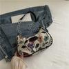 Bolsa de ombro com flor grande literária e artística de nicho feminina nova bolsa casual de axila bolsa de ombro da moda bolsa feminina de senso simples