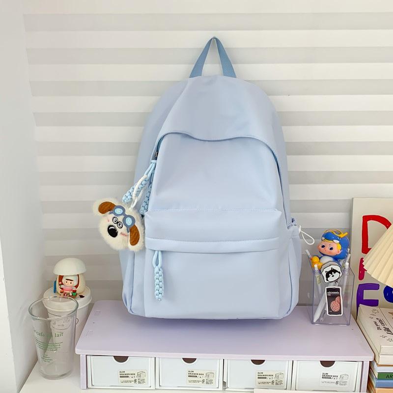 Schoolbag simple solid color schoolbag female Japanese large-capacity backpack junior high school student college student lightweight backpack 