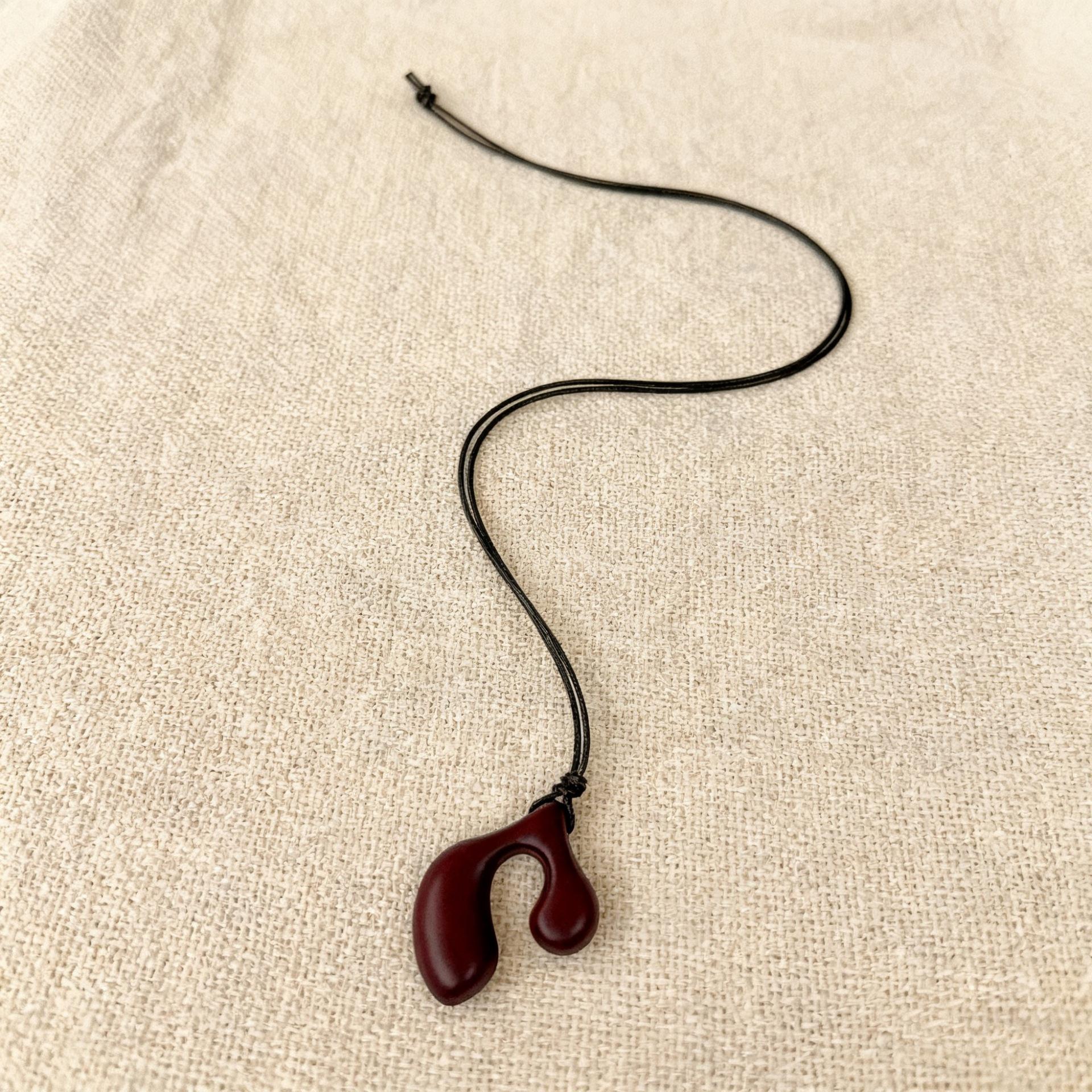 

Adjustable Long Geometric Abstract Hollow out Pendant Rope Necklace for Women Perfect for Sweatshirts And Sweaters