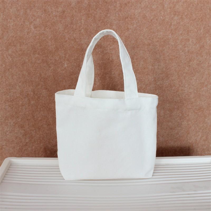 Effenkleurige eenvoudige lunchtas, draagbare canvas tas, kleine stoffen tas, draagbare canvas tas voor het opbergen van diverse spullen