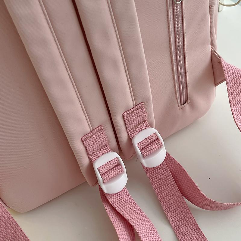 Cute Pink Backpack for Girls Fashionable Star Decorated School Bag with Plush Charm Ideal for Daily Use and School Cute Style Ba