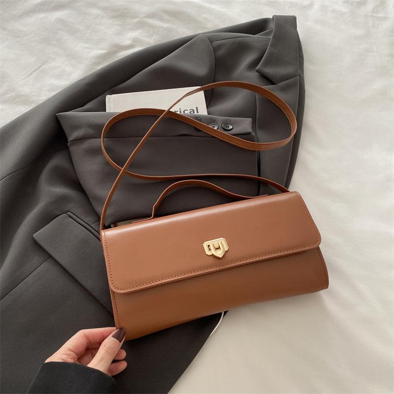 

2025 new bag women s French underarm bag niche ins fashion versatile baguette bag Korean version women s shoulder bag коричневый