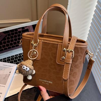 Bolso pequeño de nicho retro a la moda para mujer, nuevo bolso bandolera de otoño, bolso cubo portátil casual y exquisito