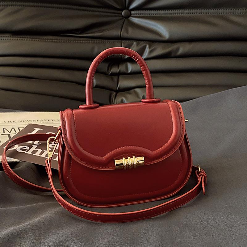 Einfache und stilvolle Handtasche mit Textur 2025 Frühling neue vielseitige Ins Schulter-Umhängetasche Satteltasche Damen