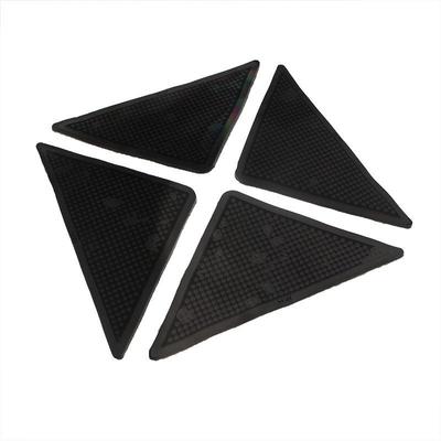 Adesivi antiscivolo triangolari ecologici per tappeti - Set da 4