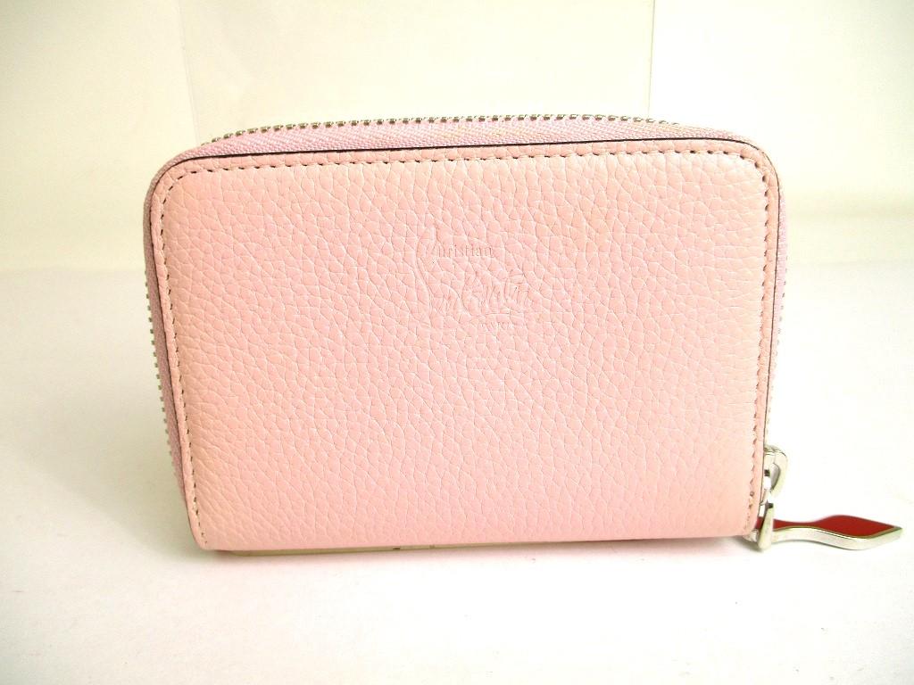 Porte-monnaie rond zippé en cuir rose clair Christian Louboutin authentique #9691 remis à neuf