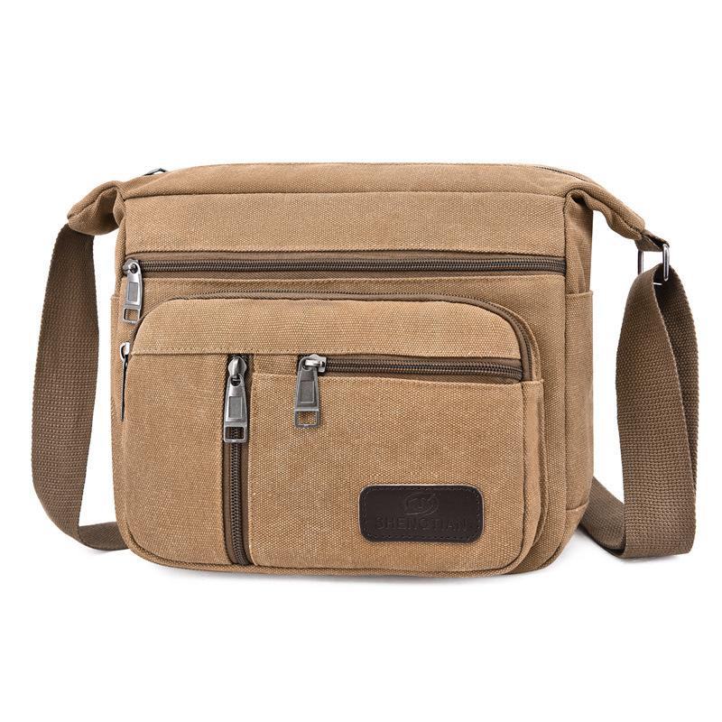 New large-capacity messenger bag men's sports travel going out shoulder bag casual multi-layer canvas bag toolkit