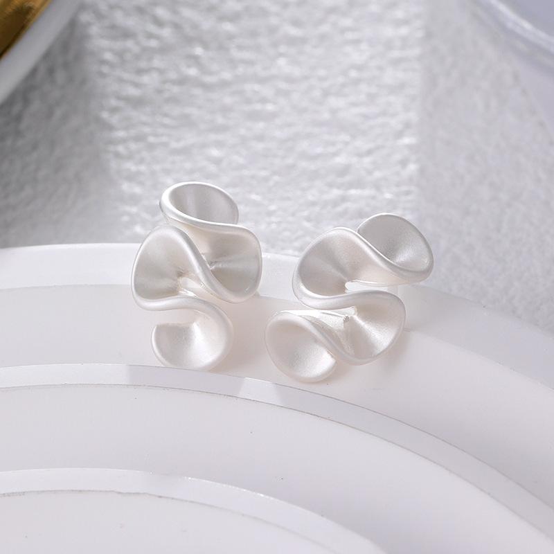 ANENJERY Orecchini a forma di fiore con spirale antizanzare per donna senza fori per le orecchie, orecchini con clip, gioielli versatili alla moda, regali