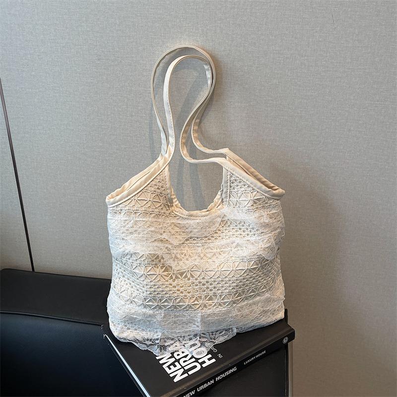 

Niche simple high-end shoulder bag spring new versatile high-value commuter tote bag