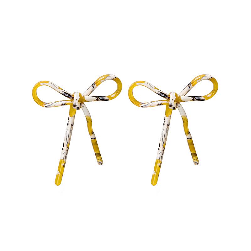 

Silver Needle French Retro Asymmetrical Bow and Tassel Earrings in Camouflage Acetate жёлтый