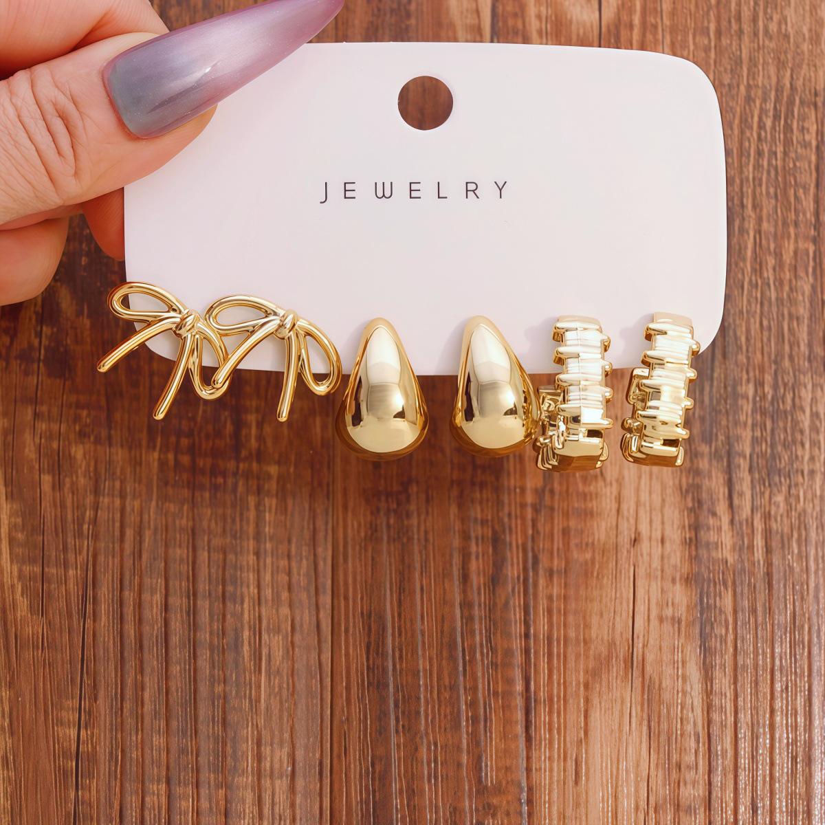 Gold Flower Bow C-Shaped Women s Earrings - Light Luxury, High-End Feel