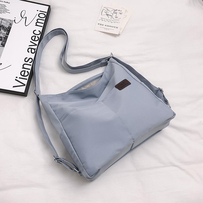 

2025 new large-capacity leisure bag women s trend niche design tote bag light leisure foreign personality backpack синий