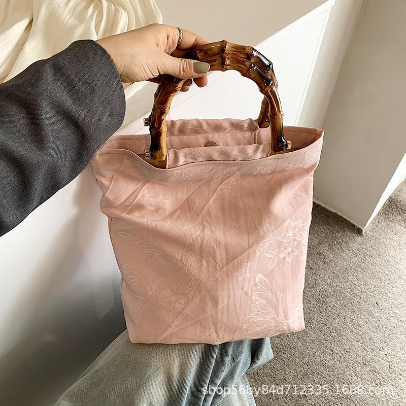 High-end Niche Bag Women's 2025 Spring and Summer New Xiaoxiangfeng Wooden Handle Portable Bucket Bag
