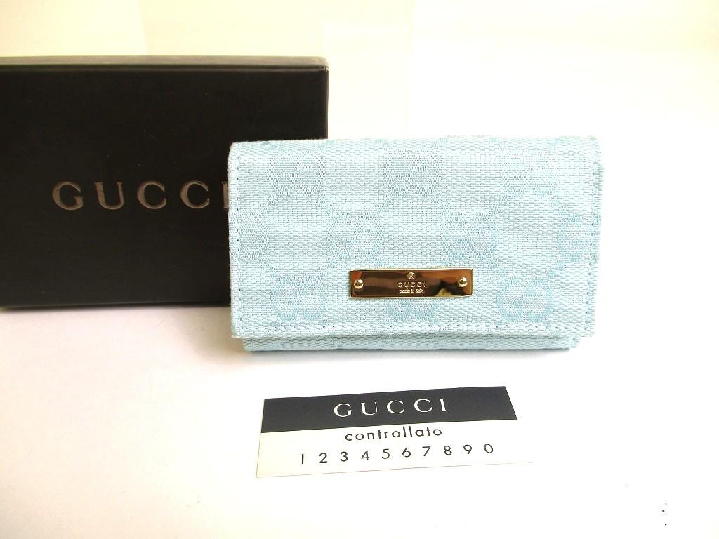 

Оригінальний GUCCI Світло-блакитний канвас GG Біла шкіра 6 фото Брелок #a738 Відреставрований