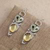 1 set of Bohemian style vintage owl hanging earrings, fashionable women's earrings