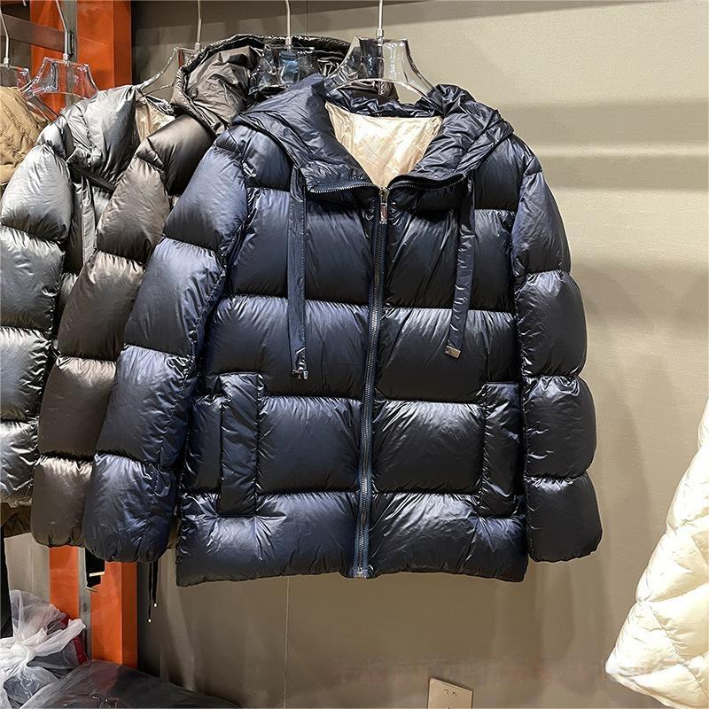 

Женский элитный короткий свободный пуховик белого гусиного пуха