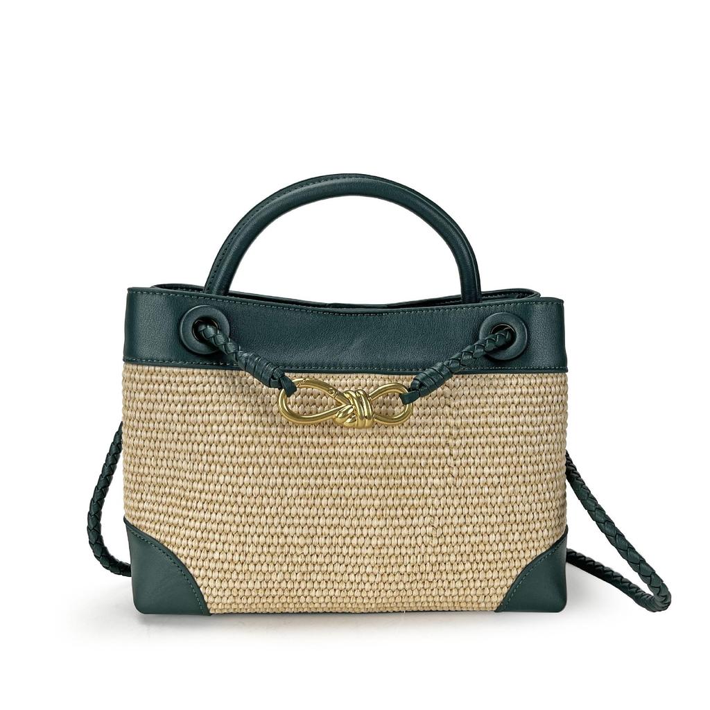 2026 New Eight Character Metal Bow Leather Splicing Lafite Grass Handmade Straw Single Shoulder Crossarm Handbag