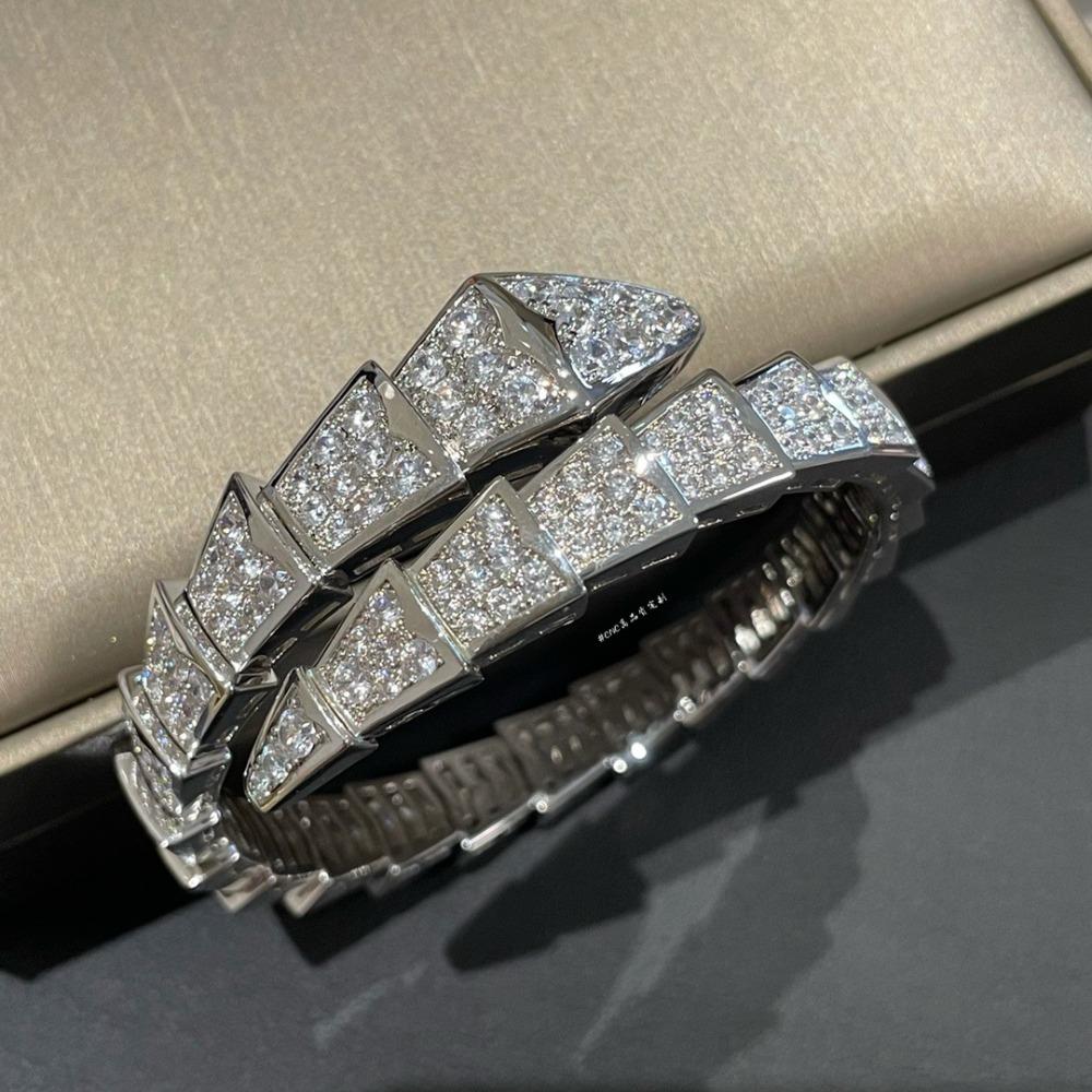 

Seiko Edition Змеиная кость Полный бриллиант Большой браслет Женский Покрытый 18К Настоящим золотом Эластичный Дух Змея Змея Браслет ЧПУ Ремесло V Золото