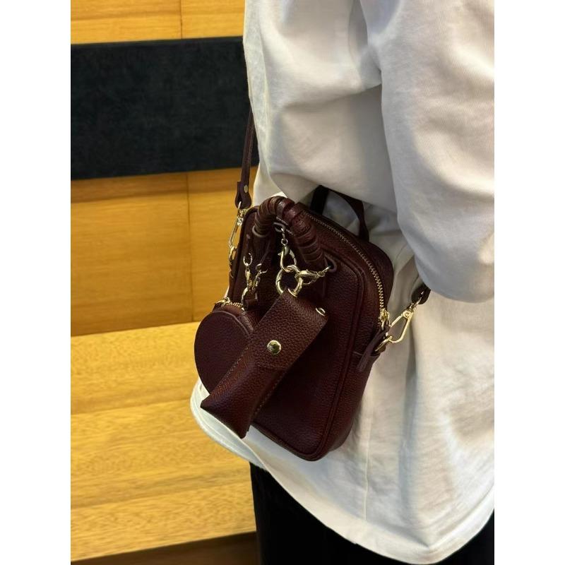 Spring and summer new women's bags niche design change mobile phone bag fashion versatile mini bag cowhide messenger bag