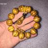 Golden Silk Phoebe Wood Bracelet 1.8: Unisex Water Ripple Design with Withered Wood, Wenwan Ornaments, Buddhist Beads.