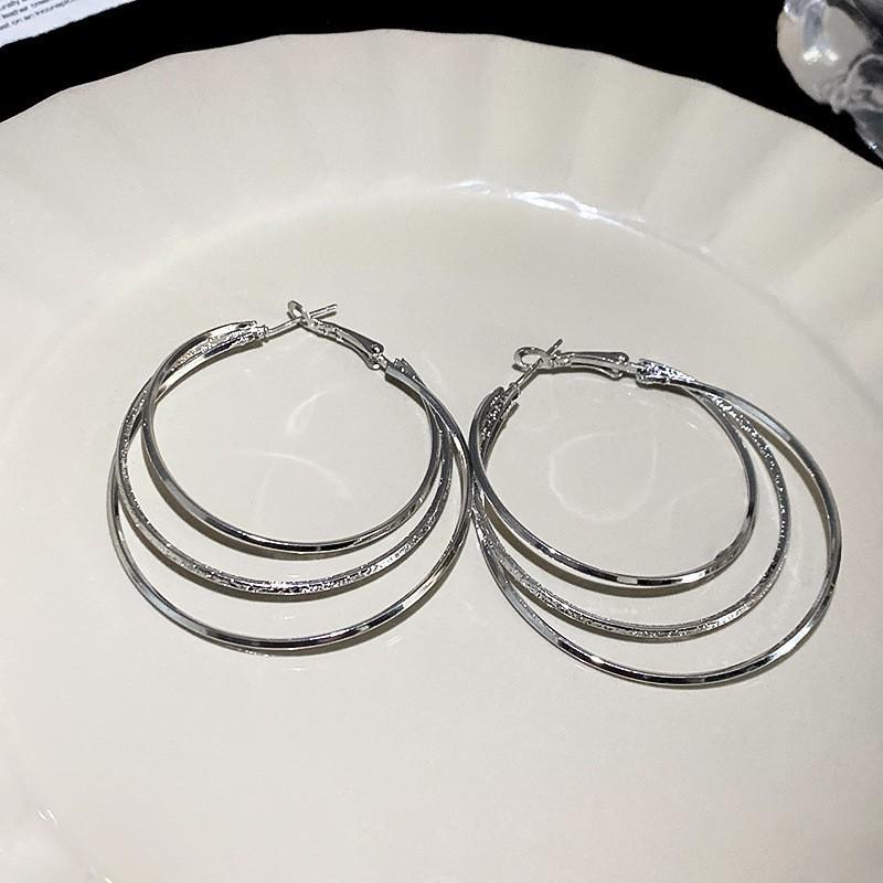 Silver plain ring earrings women's light luxury high-end stud earrings 2026 new popular niche exaggerated temperament earrings earrings