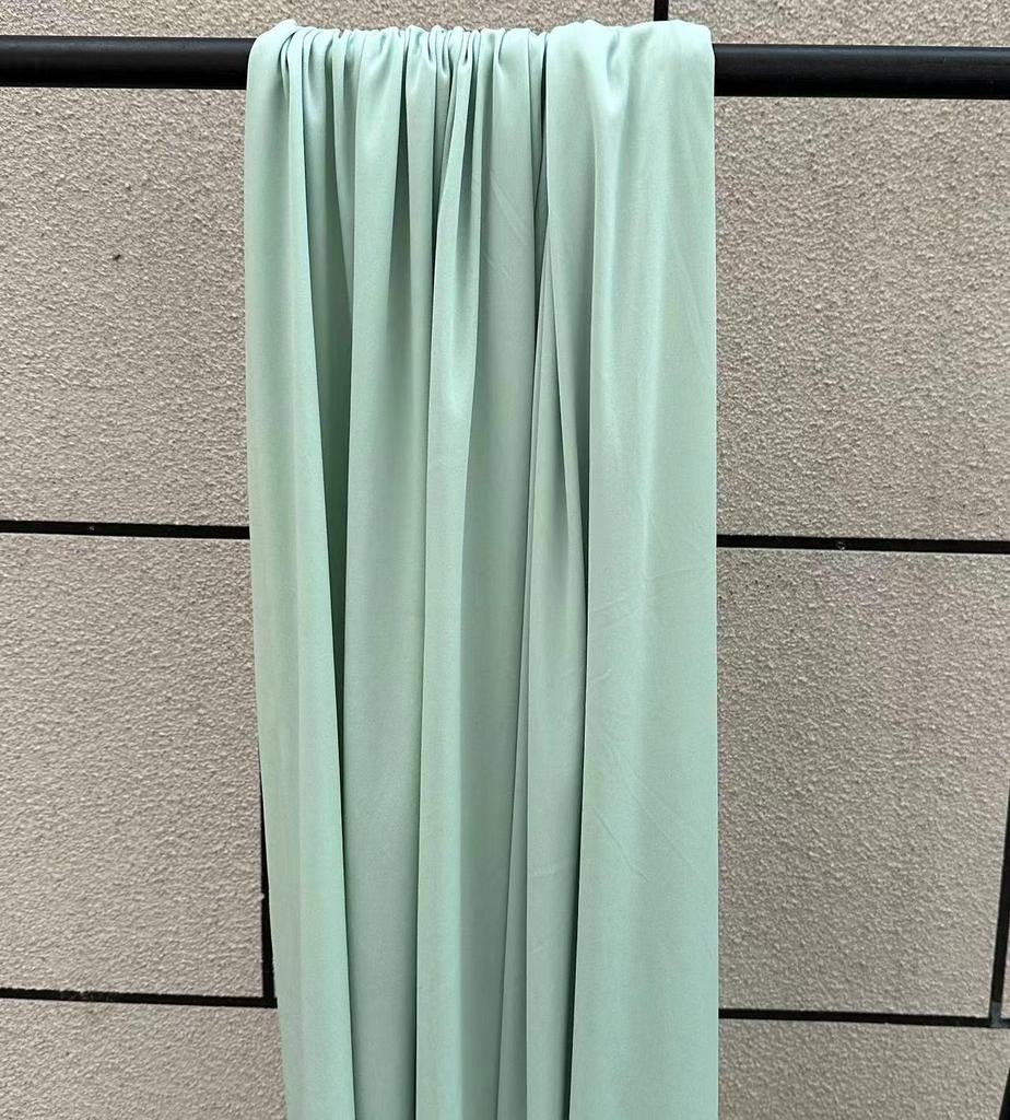 Green Stretch Milk Silk Fabric for Wedding and Hotel Drapes