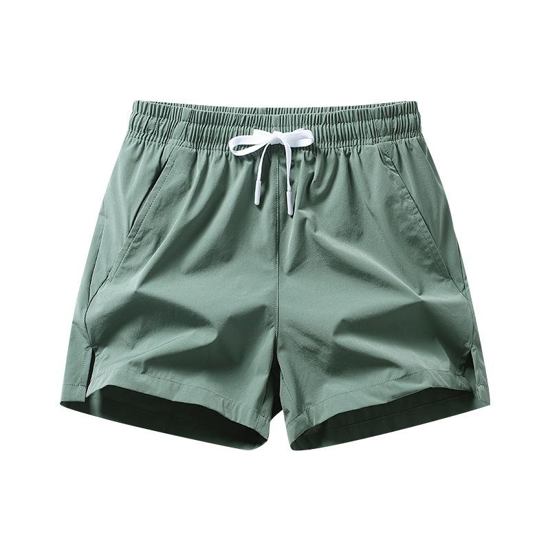 

2025 Couple Ice Silk Shorts Men and Women Multicolor Tide Three-quarter Pants Speed Dry Running Shorts Summer Stretch Outdoor 4XL зелёный