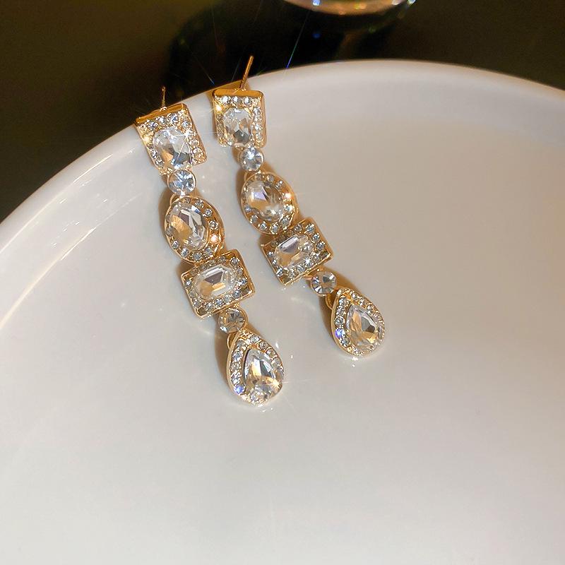 Silver Needle Zircon Flower Tassel Earrings: Elegant, High-End Studs for a Fashionable, Sophisticated Look