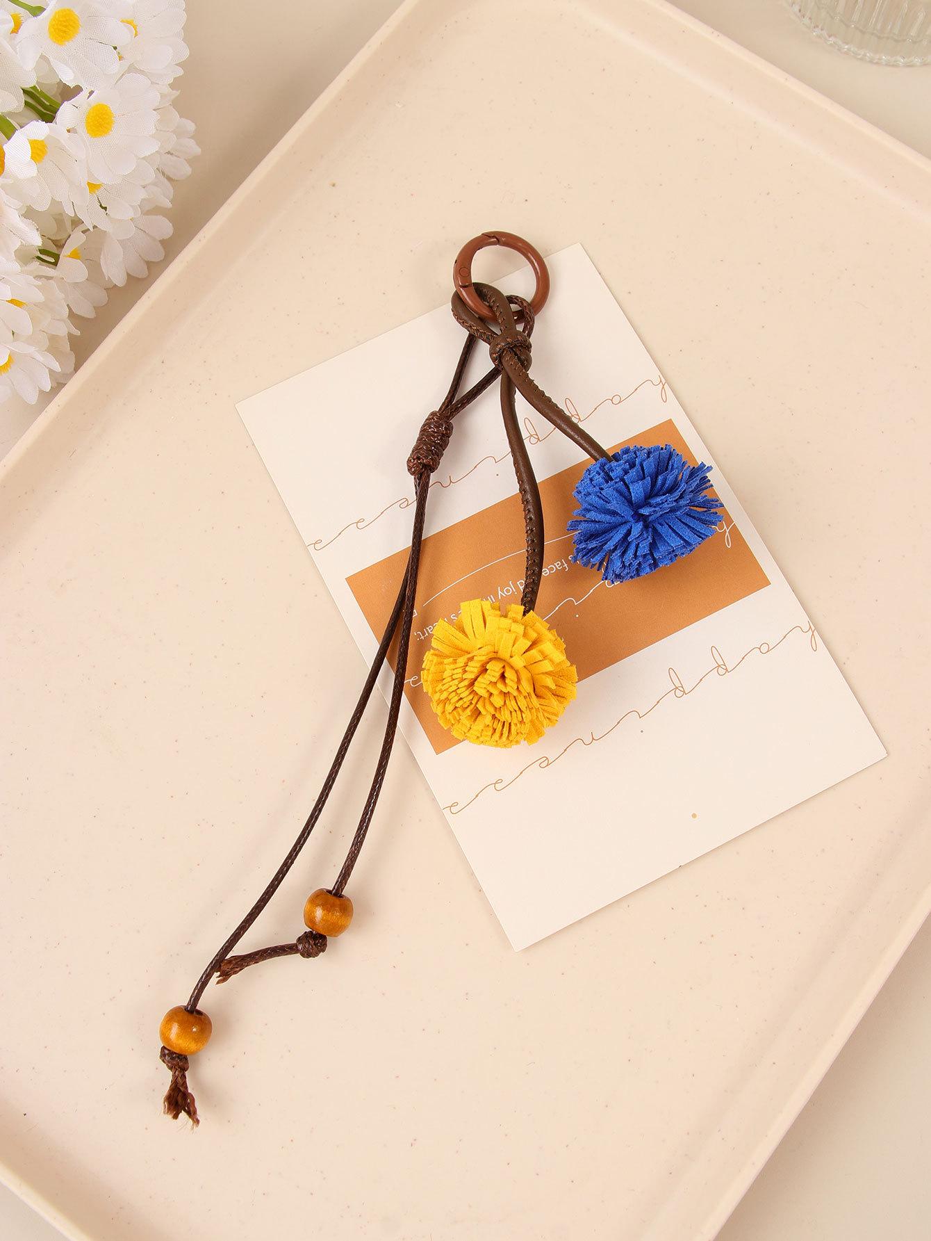 Miu series retro color fringed ball bag pendant doll pendant hand bag fringed pendant casual versatile match