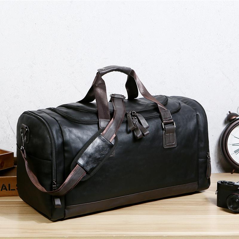 PU-Leder Übergröße Reisetasche für Geschäftsreisen von Männern, Gepäcktasche für Reiserucksäcke, Koreanische Version, Handgehalten, Einzelne Schulter