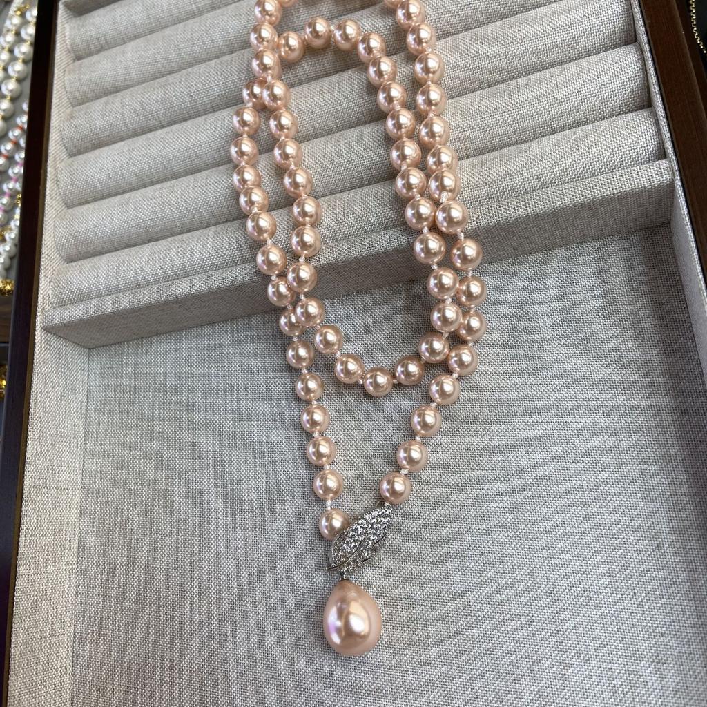 Design Sense Shijia Pearl Water Drop Necklace Women's Autumn and Winter Light Luxury High-end Sweater Chain Fashion Leaf Clavicle Chain