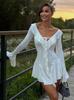 Spot European and American 2026 autumn temperament slim ruffle edge solid color horn long sleeve strap dress women