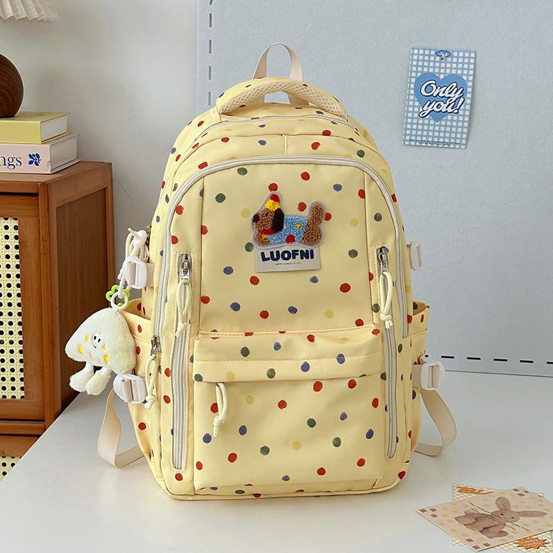 New junior high school backpack female junior high school schoolbag ins niche polka dot cute large-capacity backpack