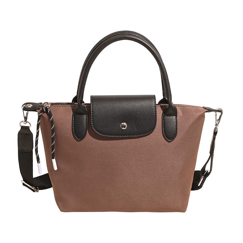 Minimalist Color-Block Oxford Cloth Handbag: Versatile, Fashionable Shoulder Bag with Unique Texture.
