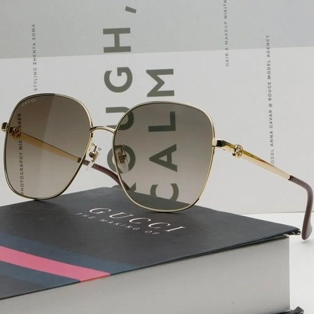 Sunglasses GG1089SA 002 Square Oversized Gold Rim Daily