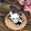 Resin Skeleton Statue Mystical Raven on Skull Statue, Gothic Crow Perching Figurine Niche Hunting Ornaments with Book, Spooky Halloween Sculpture for