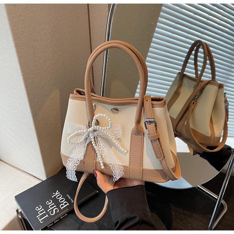 Niche design bags, new summer versatile messenger bags, popular portable bucket bags today