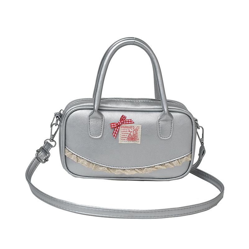 Korean ins hand-held bowling bag women's 2025 spring new fashion shoulder oblique span bag high-end small square bag