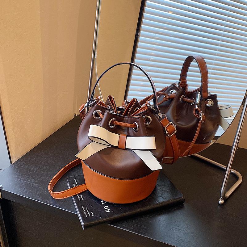 Bow portable small bag women's summer new trendy fashion contrasting color bucket bag shoulder messenger bag