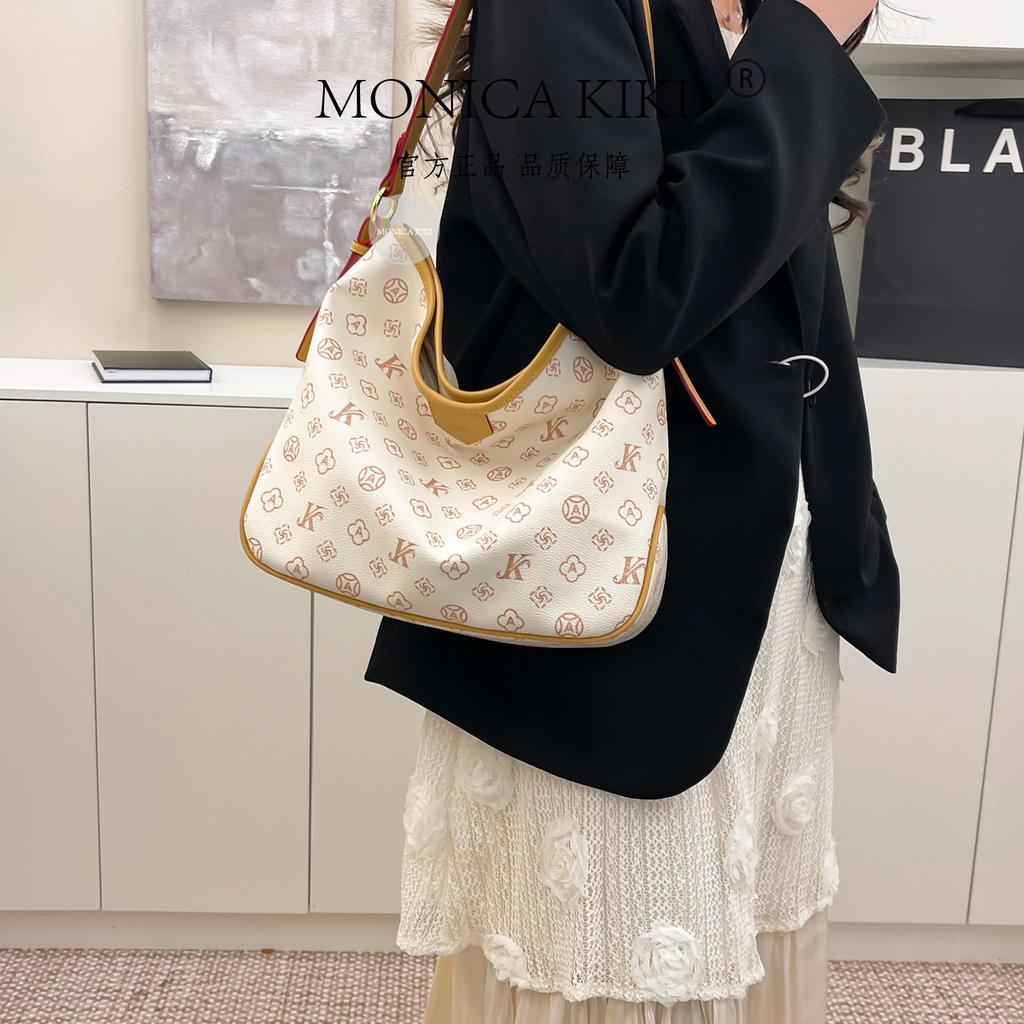 Old flower bag 2025 handbag, one shoulder oblique span bag, tote bag, high-end temperament, large-capacity women's bag.