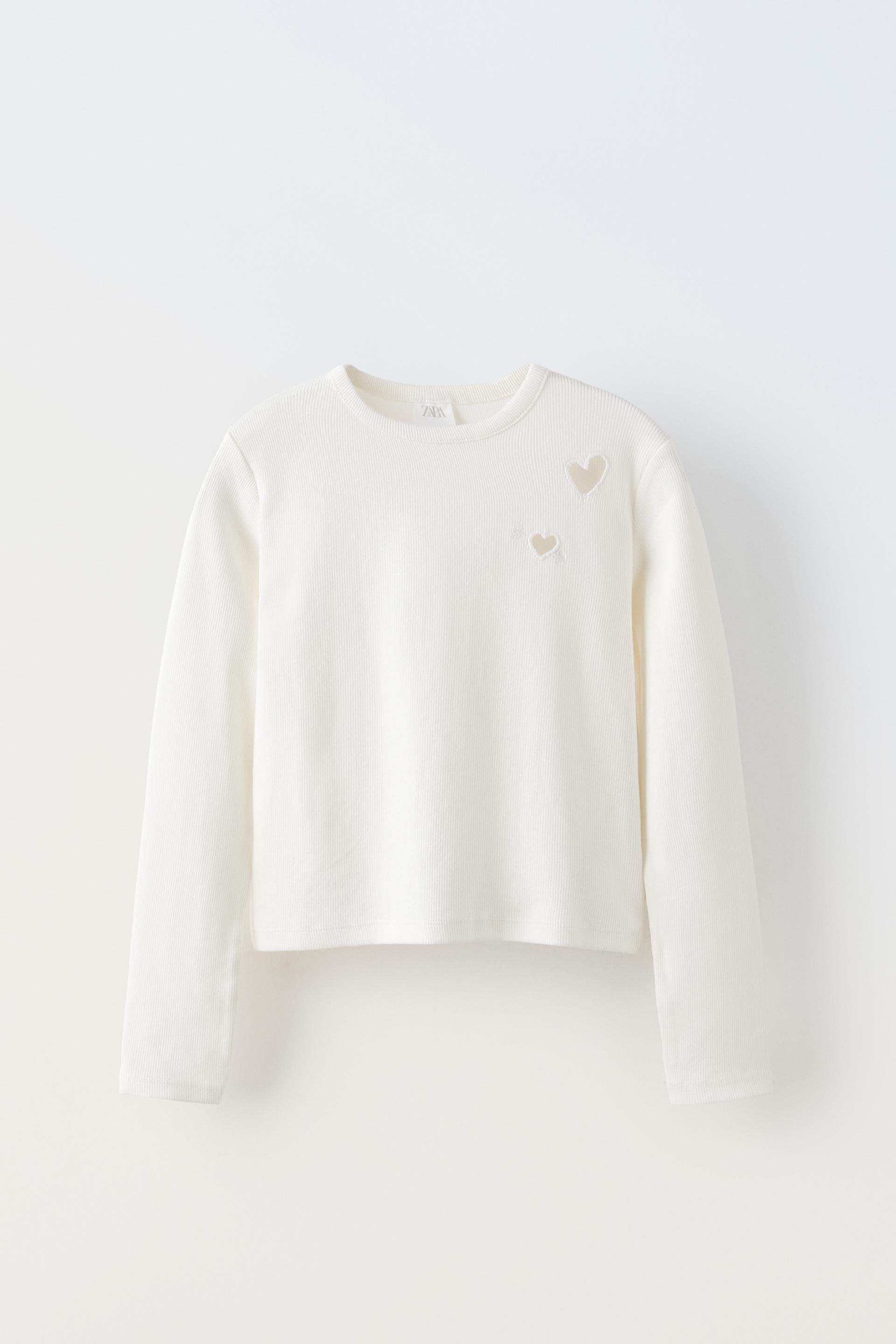 

ФУТБОЛКА В РЕБРИКУ С ВЫРЕЗАМИ