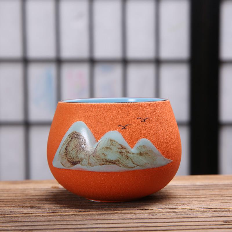 Hand-Painted Black Pottery Zen Tea Cup - Retro Mountain Design, Kung Fu Ceramic Masterpiece for Tea Tasting and Guest Reception.