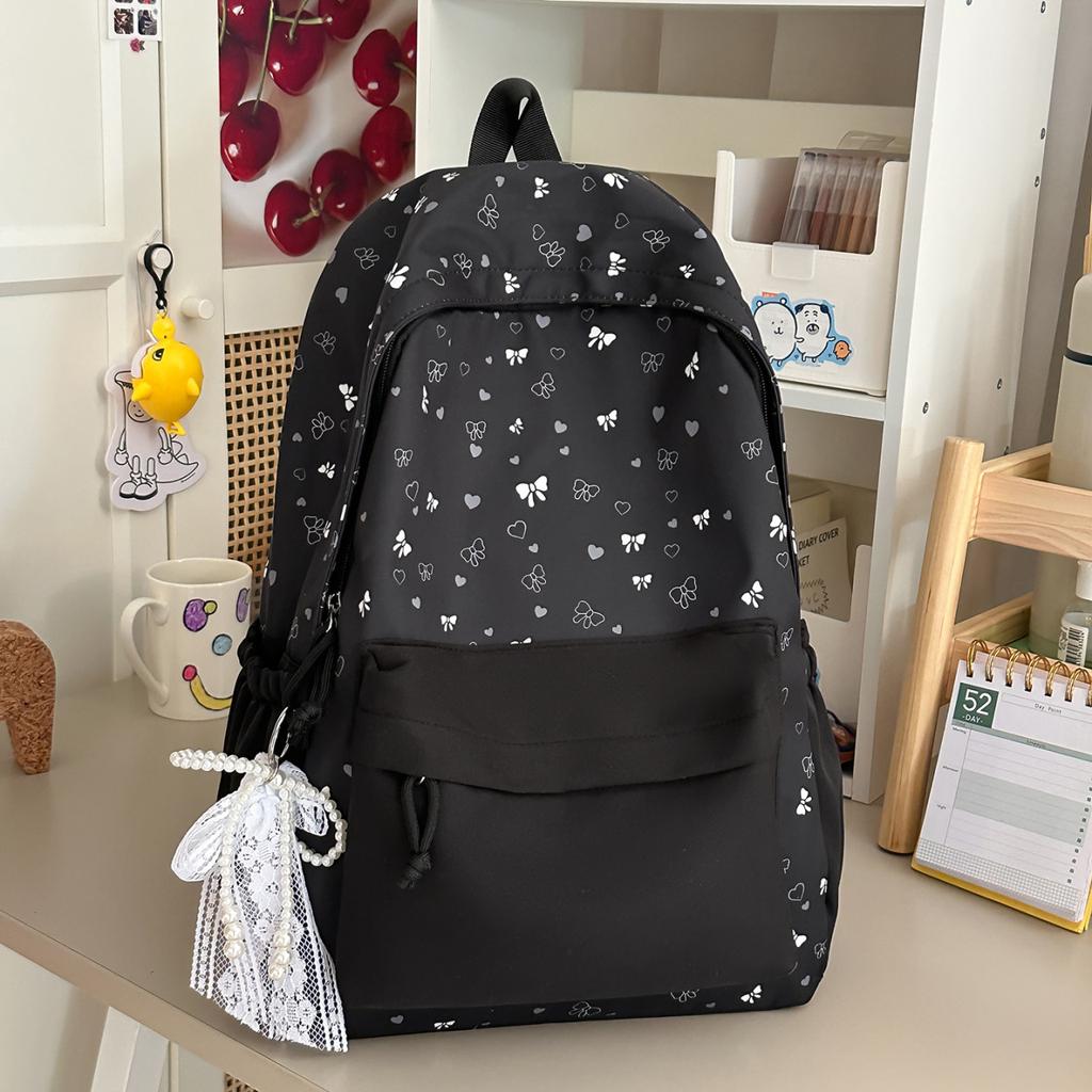 Schoolbag Junior high school bow high value niche 1011 new girl heart large capacity lightweight versatile backpack