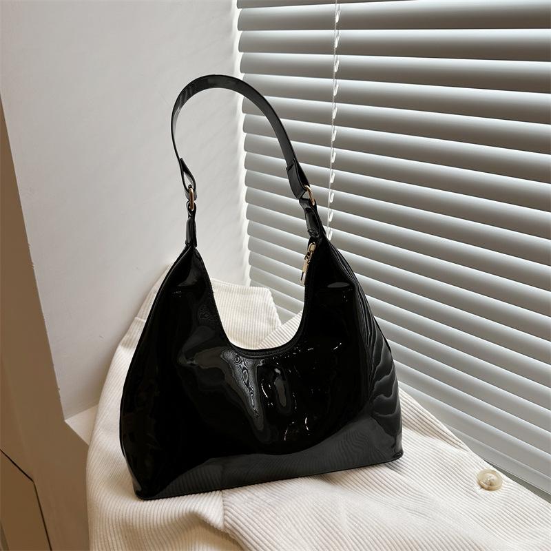 Temperament lässig glänzend 2025 ausländischer Stil Frühling und Sommer neu Lackleder Mode leichte Luxus Schultertasche tragbar Unterarm Damen Tasche