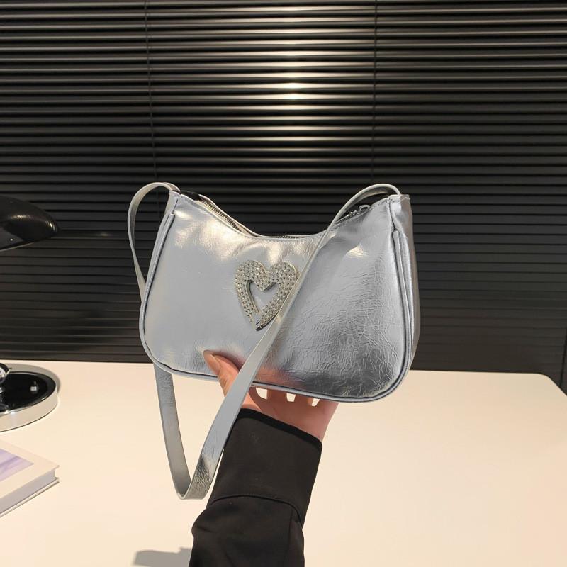 Trendy White Casual Crescent Handbag For Women Offering Versatile Everyday Use And Fashion Appeal серебряный