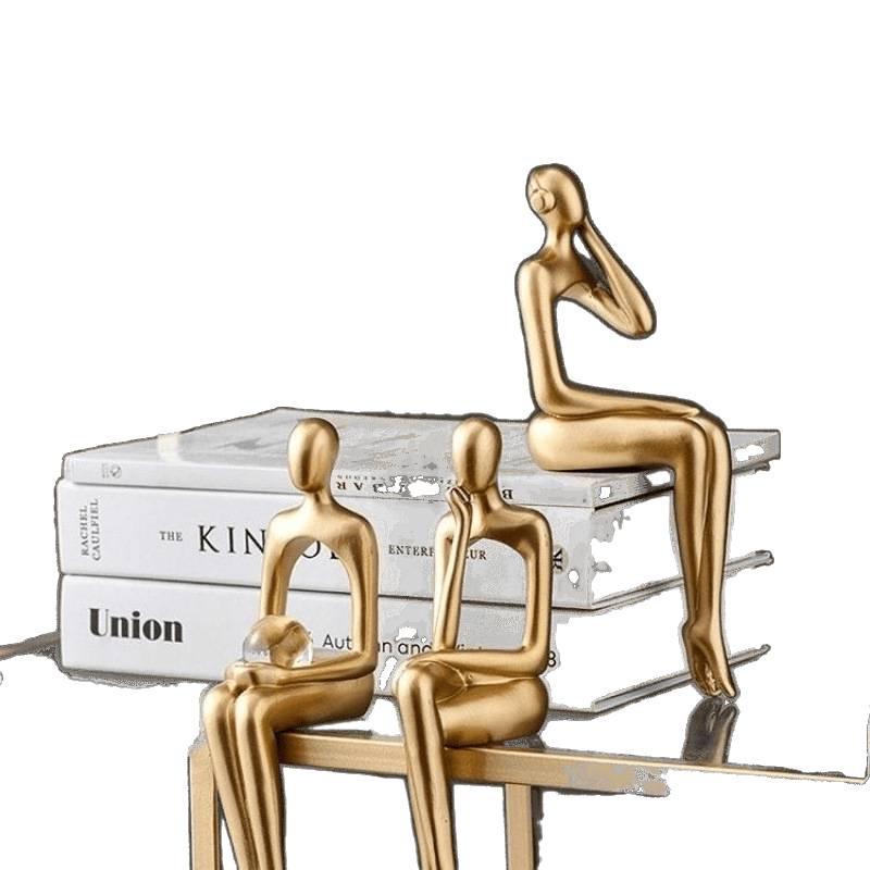 Elegant abstrakt sittande figurskulptur för heminredning