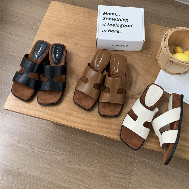 Design sense niche slope heel one-word slippers women's summer wear 5 new high-end cool slippers vacation beach shoes